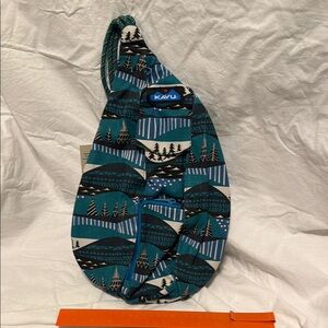 KAVU Teal and Black Patterned Sling Bag